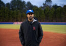 Back with Black: new head coach for the varsity baseball team